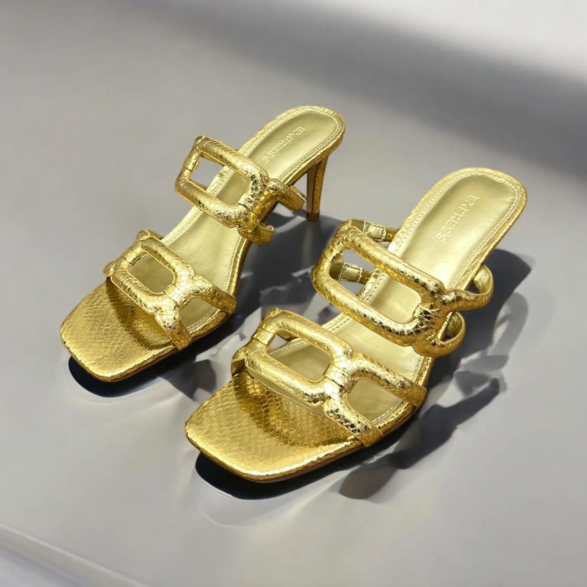 EXPRESS TEXTURED LEATHER LOW HEEL MULE IN GOLD