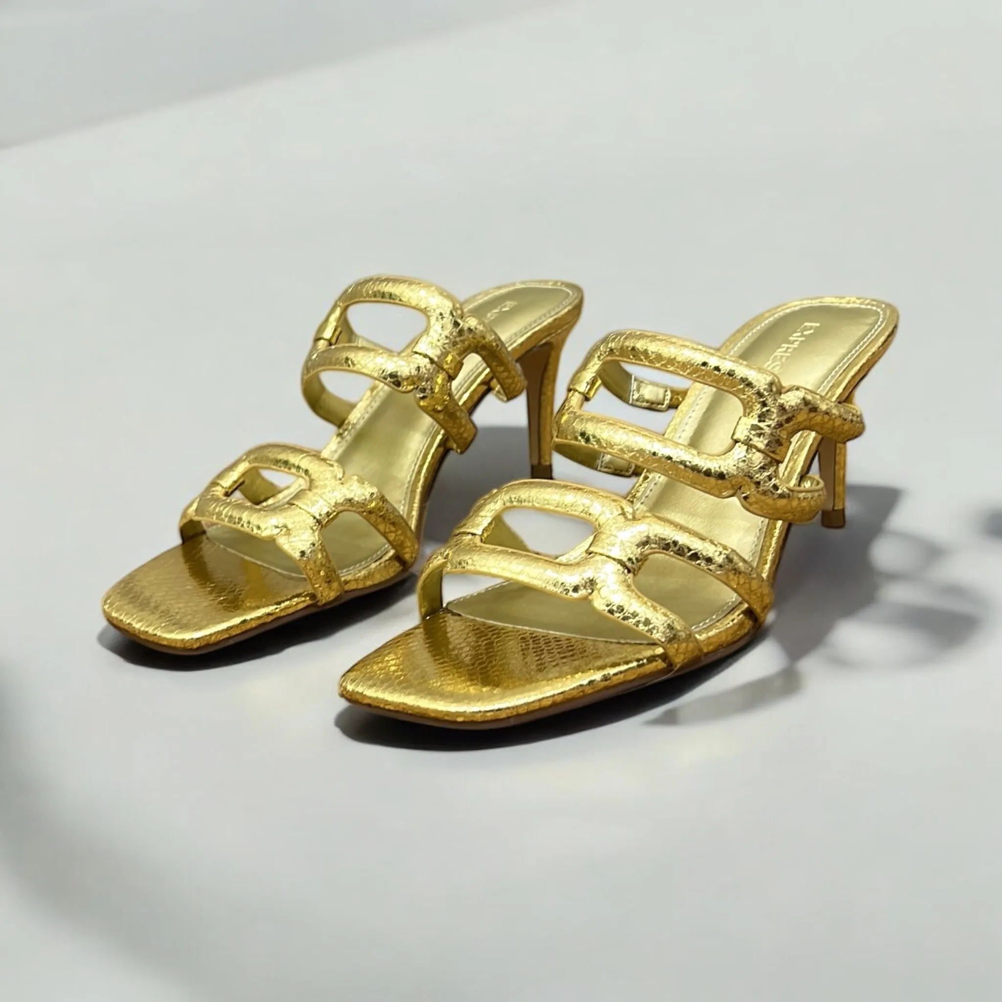 EXPRESS TEXTURED LEATHER LOW HEEL MULE IN GOLD